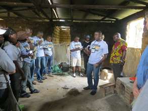 village leaders demonstrate efficient cookstoves