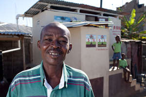 Tony "Bos Tony" Sinius, SOIL PUblic Toilet Manager