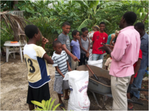 Leading an EcoSan education class at the SOIL farm