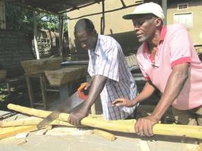 KIRUCODO Volunteers working on cover frame