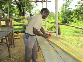 Project Leader working on timber for hives