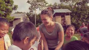 Kids with Alianza Arkana volunteer