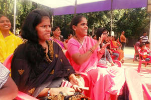 A mother cheers for her child at UIF's Sports Day