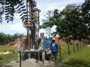 Drilling company installing a borehole at Chiedza