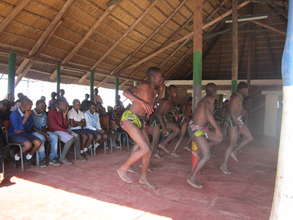 Children's drama group performing a play