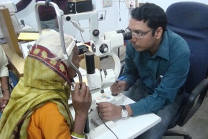 Ophthalmologist Checking Patient