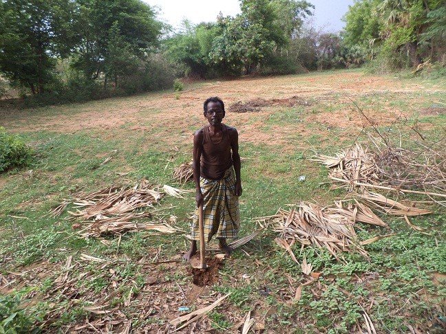 Sahasram working in the field