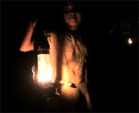 Girl with a kerosene lamp