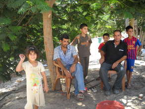 Local farmers with children