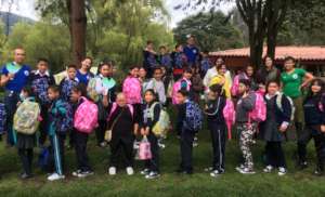 Motivating children with nice school kits.