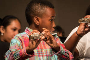 A flutist concentrates on his music-making!