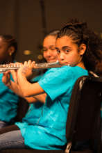 A flute player poses proudly! Credit: Simon Leung