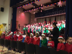 Young students sing at a holiday concert!