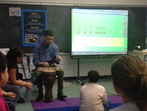 Students listen to rhythms produced