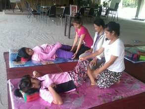 Kru Lek teaching the arts of massage