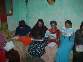 Women practice reading together!