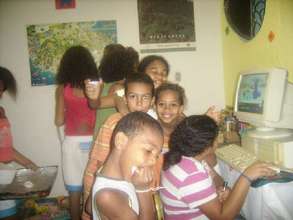 Children with the projects one computer
