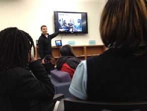 Skyler presents to students and parents