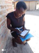 Signing to Receive Her $40 Prize!