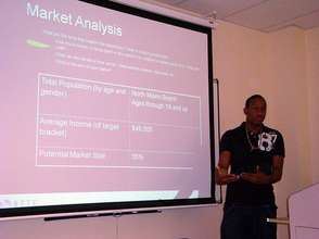 A NFTE student practicing his presentation in 2010