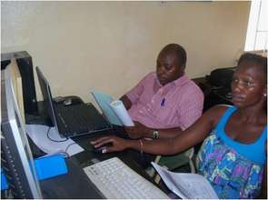 youths receiving computer training