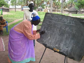 Akuol attends literacy training in the village of Pacong