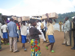 Students Unload Boxes of Supplies at Port