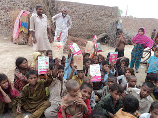 Buy school supplies for gypsy children in Pakistan