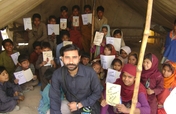 Buy school supplies for gypsy children in Pakistan