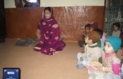 Buy books and supplies for a classroom in Pakistan