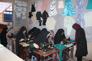 Women Using New Sewing Machines
