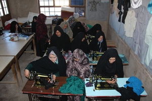 Students in an AIL sewing course