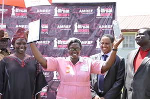 Esther Madudu with REAL Award