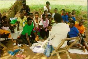 Joan training girls in Uganda