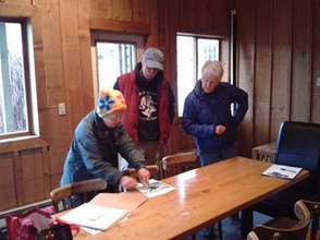 Howard Garrett & board members planning the Center