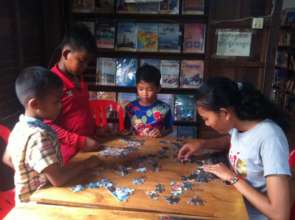 Children are playing game with a librarian