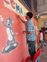 Paint school by group of teachers and students