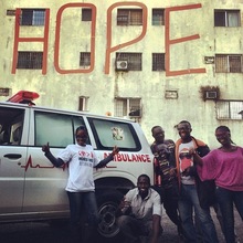Some of our amazing team with the MTM ambulance.