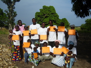 The graduates in Dialakoro Keleya show their certificates.