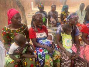 Parents waiting for vaccinations Oure, Mali 2023