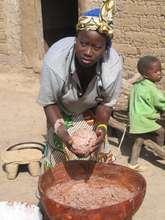 Village Woman Making Shea Butter