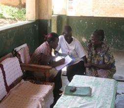 Volunteer Remy registering participants