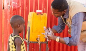 Our staff demonstrates how to wash hands