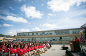 1 Curtain, 1 School, 1300 Unified Students