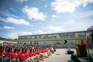 1 Curtain, 1 School, 1300 Unified Students