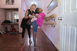 Ballet teacher and Mariposa girl in class