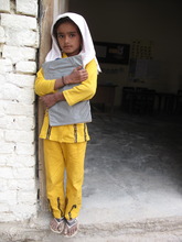 A DIL Student on her way to school
