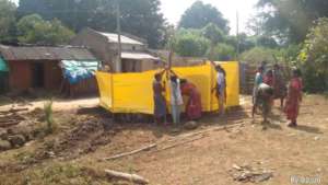 Women making a bathing space for personal hygiene