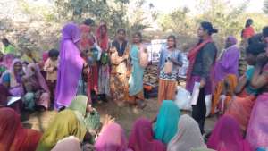Women receiving the Dignity Kits