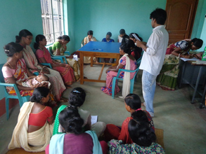 Women filling out NJPC-A Million Voices form